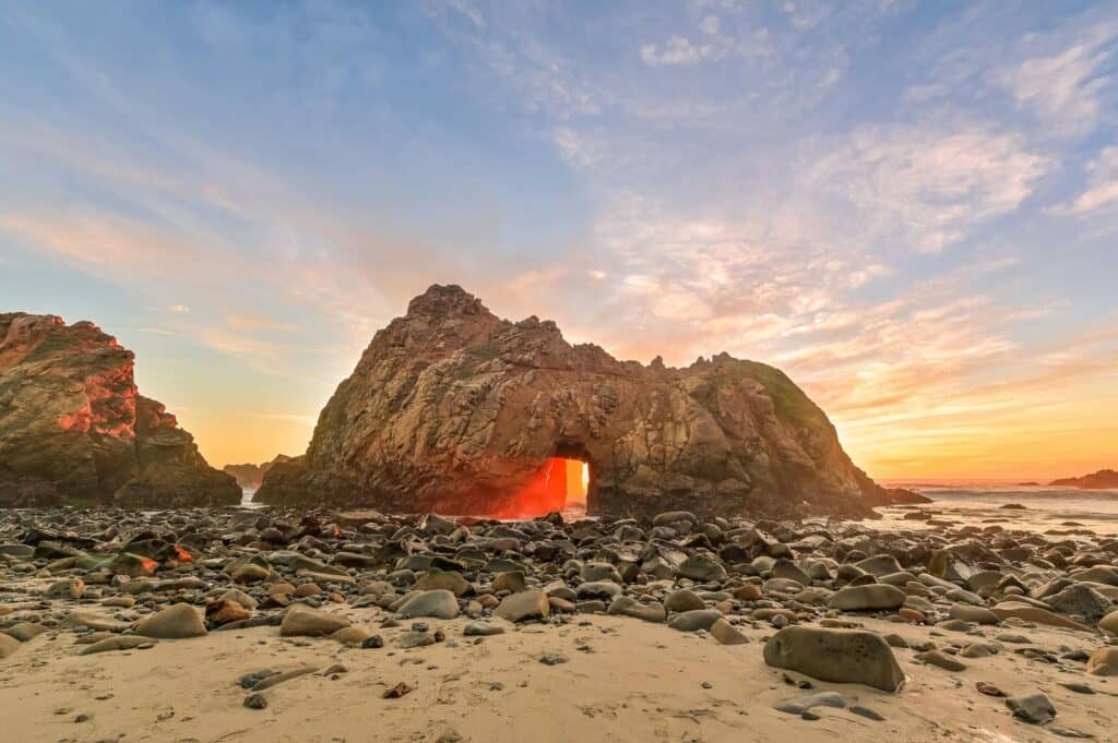 Sunlight Coming Through a Rocky Arch in Pfeiffer Beach