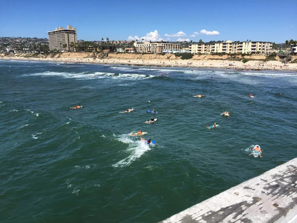 Waiting for the perfect wave, On Crystal Pier in SanDiego Pacific Beach